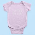 mockup-of-a-little-baby-s-onesie-over-a-flat-surface-222-el